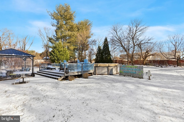 exterior space featuring a gazebo and a wooden deck