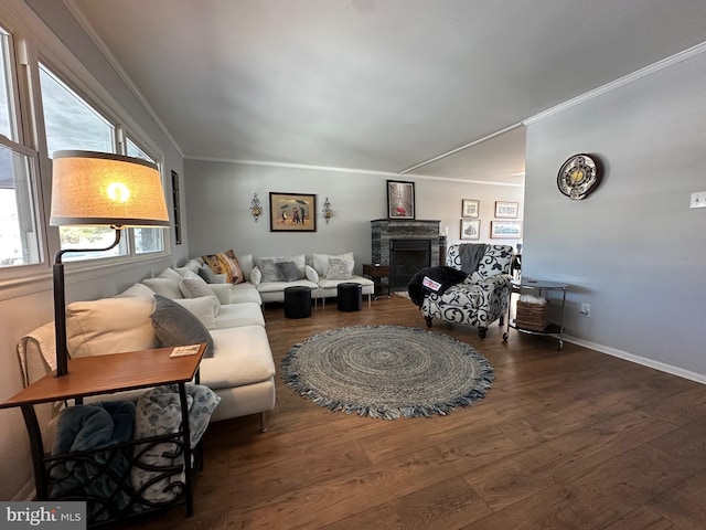 living room featuring dark hardwood / wood-style floors and crown molding