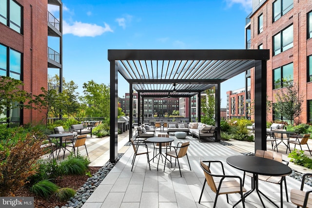 view of patio / terrace with outdoor lounge area and a pergola