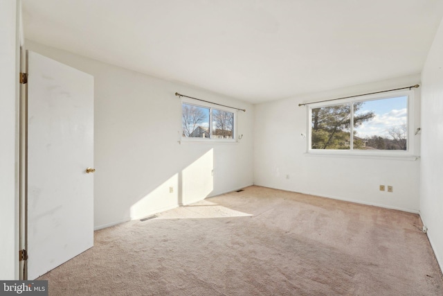 empty room with light carpet