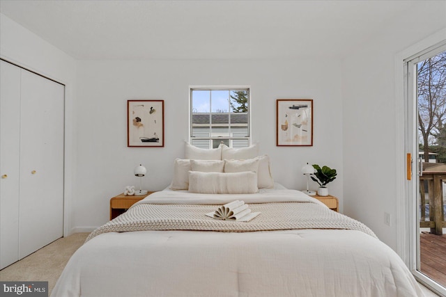 carpeted bedroom with a closet