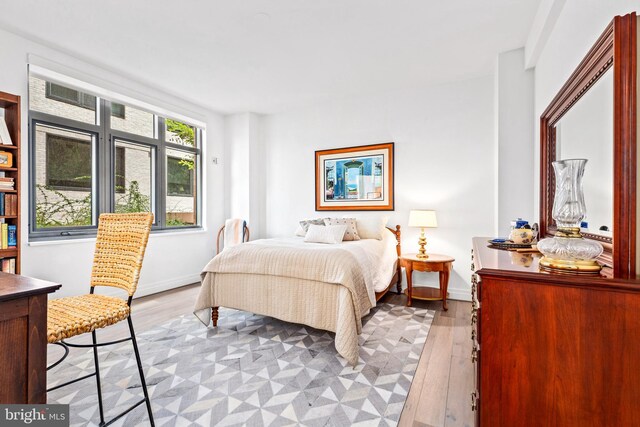 bedroom featuring light wood-type flooring