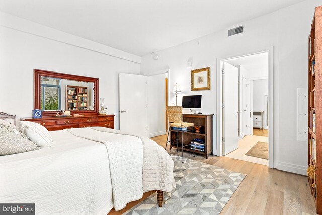 bedroom featuring light wood-type flooring