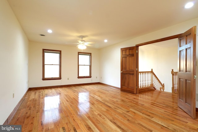 unfurnished room with light wood-type flooring, visible vents, recessed lighting, baseboards, and ceiling fan