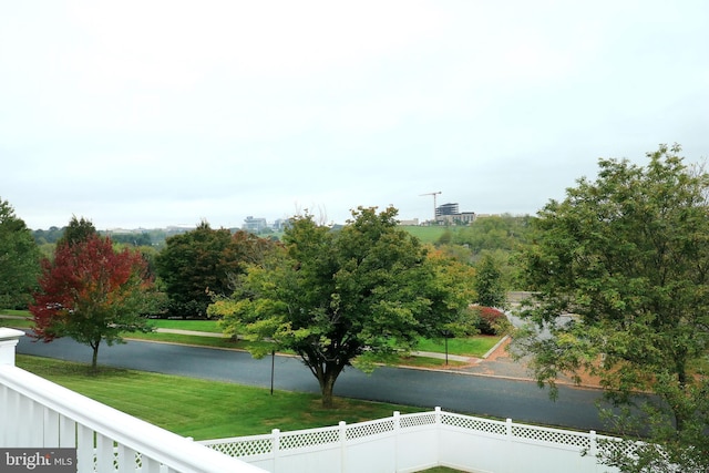 property view of water featuring fence