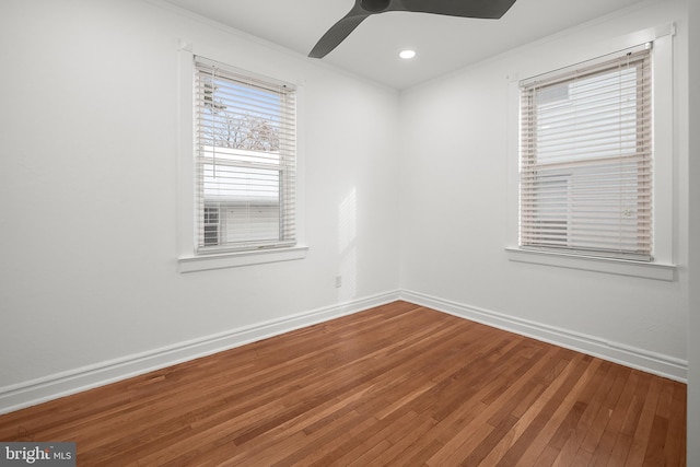 unfurnished room featuring ceiling fan, crown molding, and hardwood / wood-style flooring