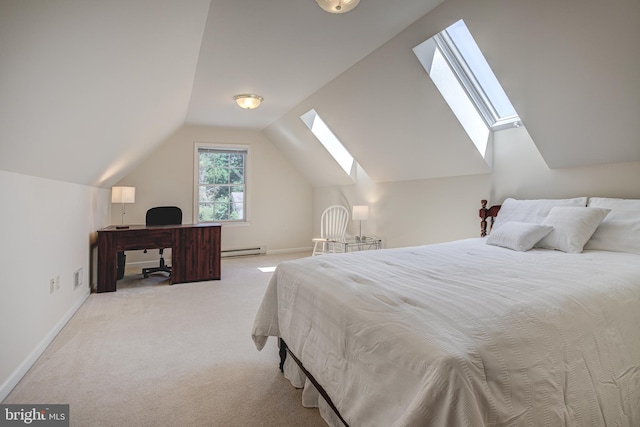 carpeted bedroom featuring lofted ceiling with skylight, a baseboard radiator, and baseboards