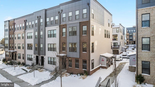 view of snow covered property