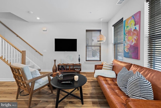 living room with hardwood / wood-style flooring