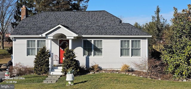 bungalow with a front lawn