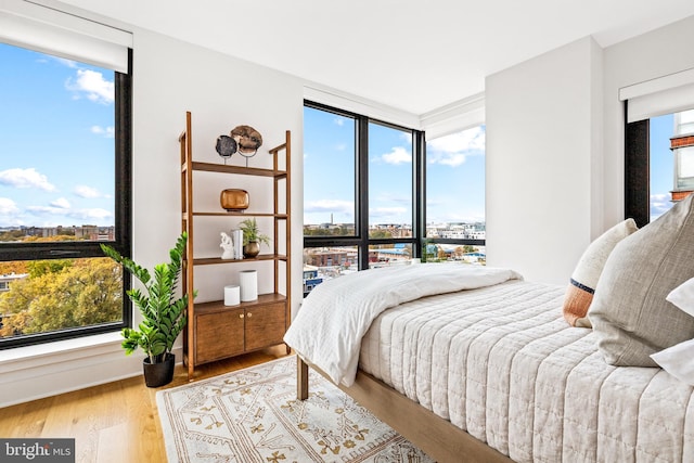 bedroom featuring hardwood / wood-style floors