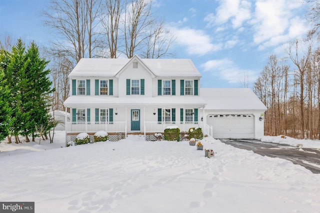 colonial home with a garage