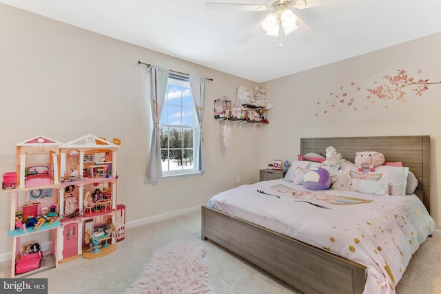 bedroom with ceiling fan and light colored carpet