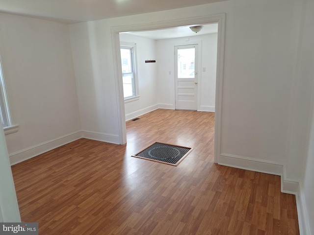 foyer with hardwood / wood-style floors