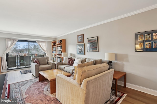 living room featuring dark wood-type flooring and ornamental molding