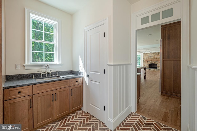 bathroom with vanity and a fireplace