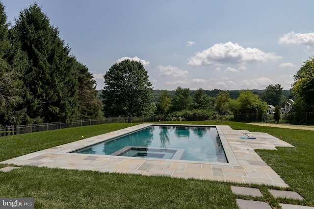 view of swimming pool with a lawn, a patio area, and an in ground hot tub