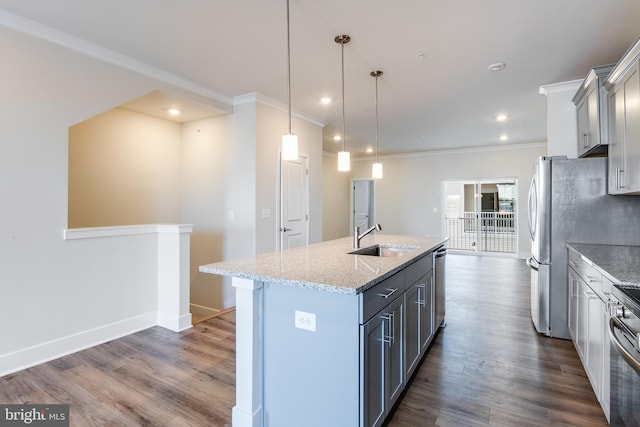 kitchen with gray cabinetry, dishwasher, sink, and an island with sink