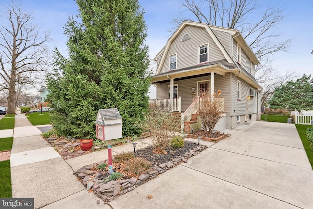 view of front of home featuring covered porch