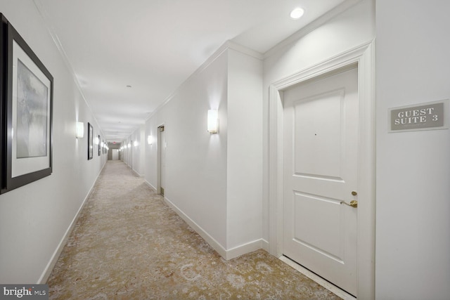 corridor featuring ornamental molding