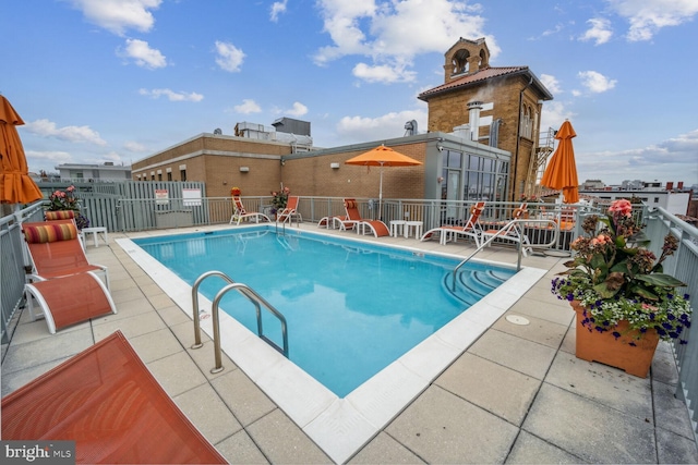 view of pool with a patio