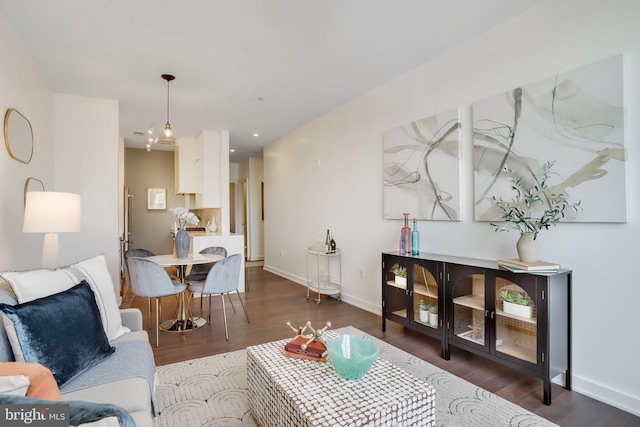 living room featuring dark hardwood / wood-style floors