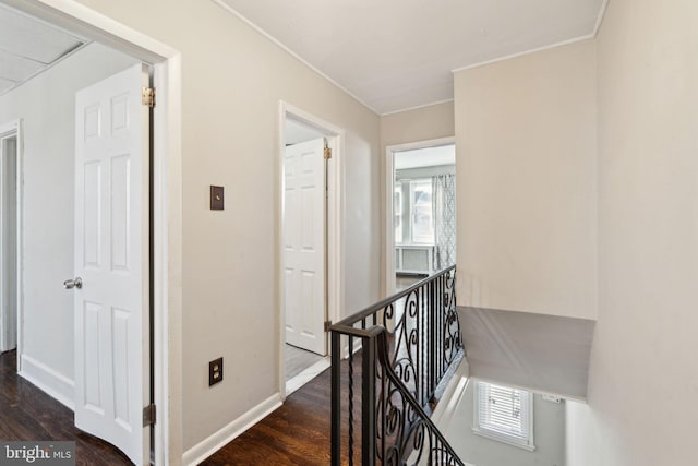 corridor featuring dark wood-type flooring