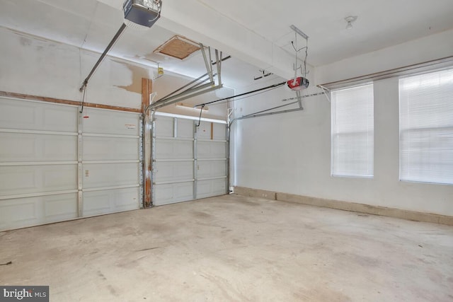 garage featuring a garage door opener