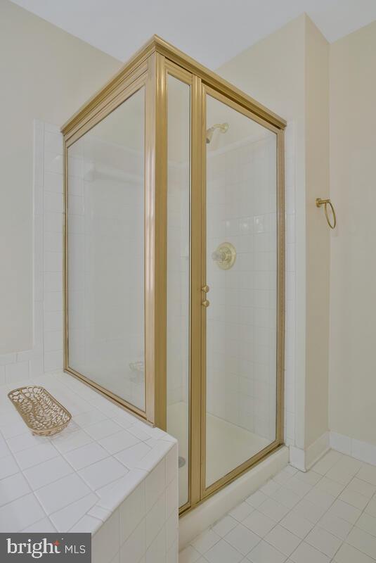 bathroom featuring walk in shower