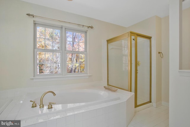 bathroom featuring tile patterned floors and plus walk in shower