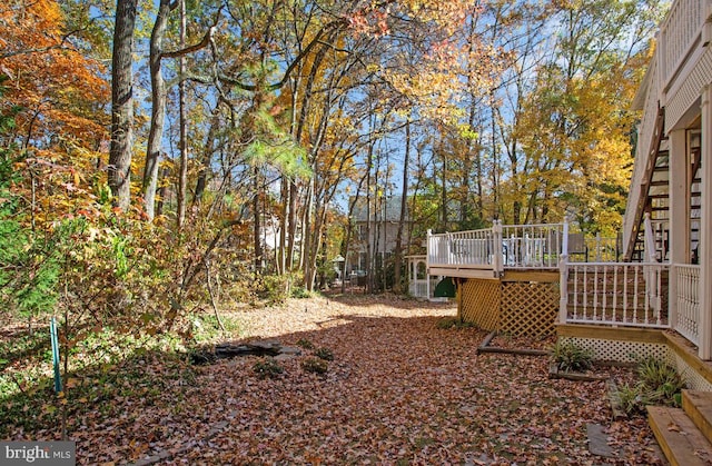 view of yard featuring a deck