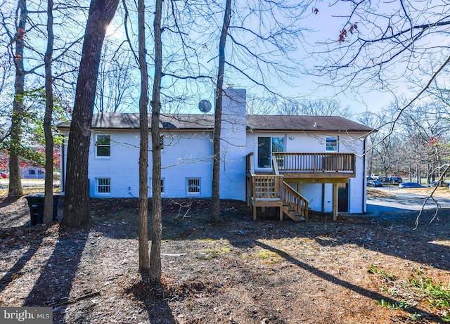 rear view of house with a deck