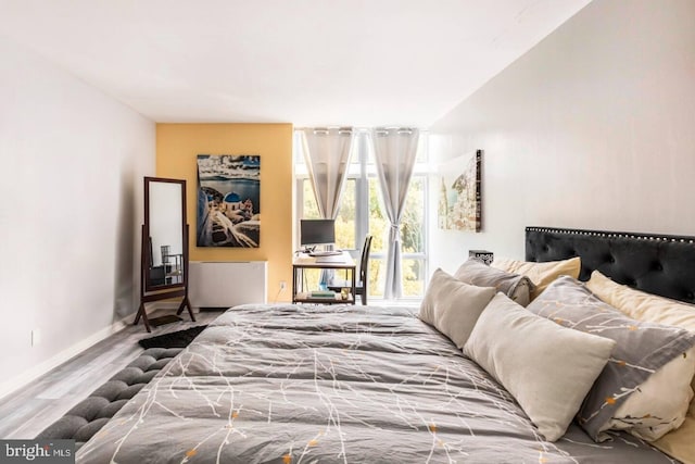 bedroom featuring hardwood / wood-style floors