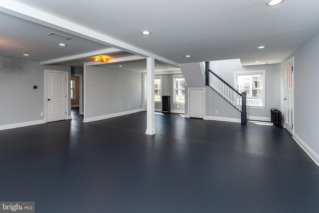 basement featuring radiator heating unit