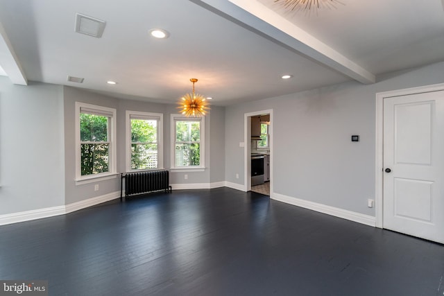 unfurnished living room with beam ceiling, dark hardwood / wood-style flooring, radiator heating unit, and a notable chandelier