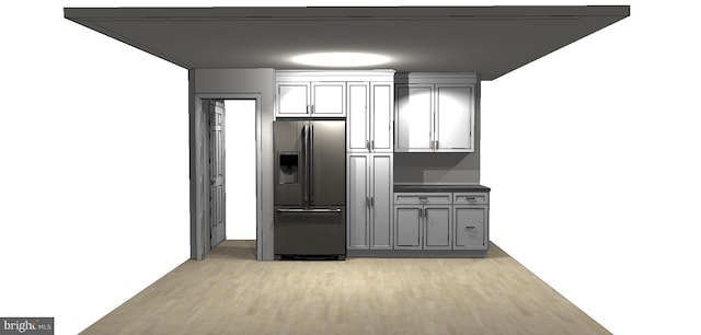 kitchen with stainless steel fridge with ice dispenser, gray cabinets, and light hardwood / wood-style floors