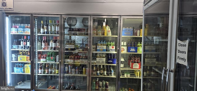 storage area featuring wine cooler