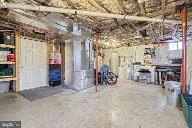 basement with heating unit and water heater