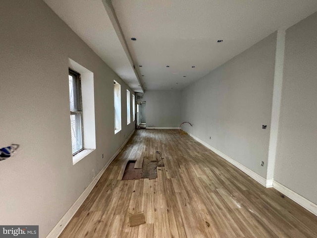 interior space with hardwood / wood-style floors and a healthy amount of sunlight