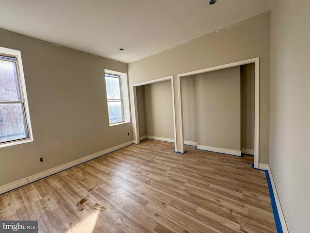 unfurnished bedroom featuring light hardwood / wood-style floors