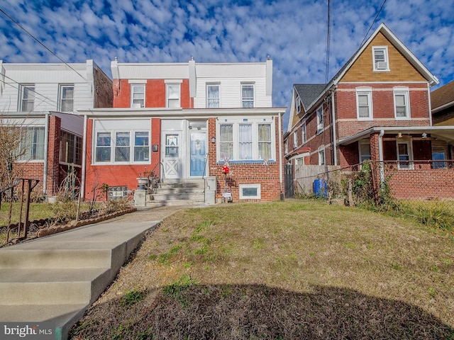 view of front of home featuring a front lawn