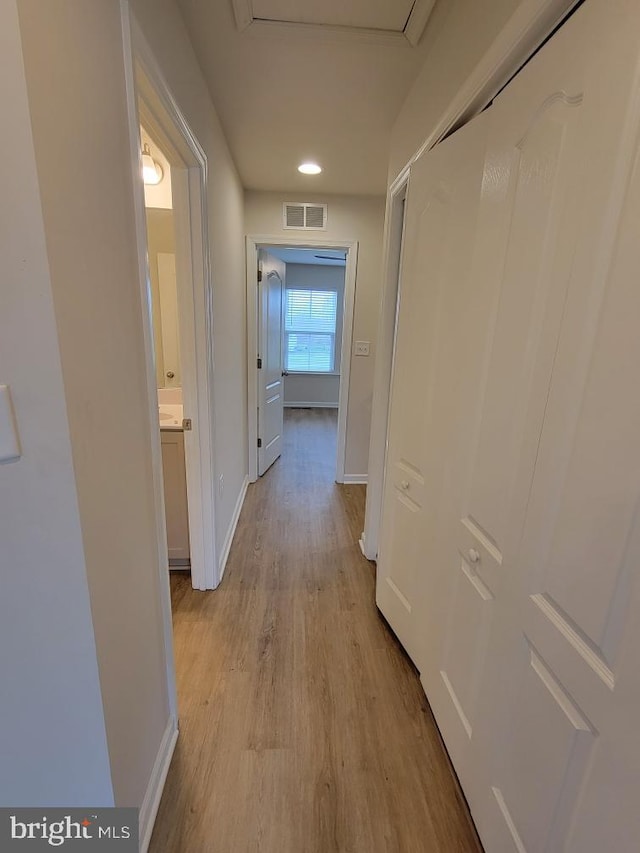 hallway featuring light hardwood / wood-style floors