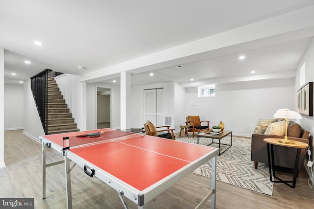 playroom with light hardwood / wood-style floors