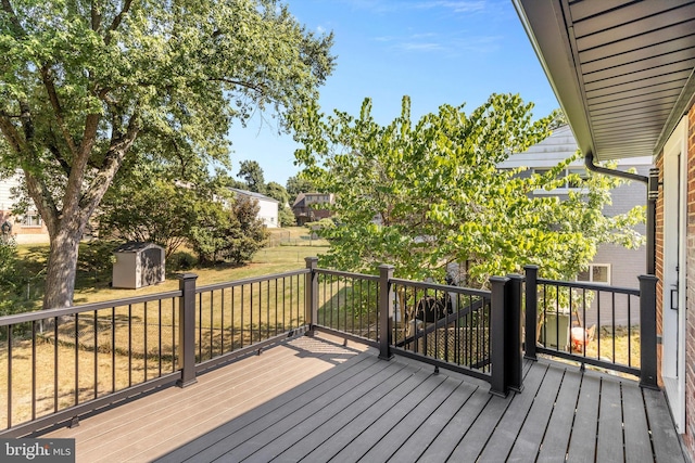 deck featuring a shed