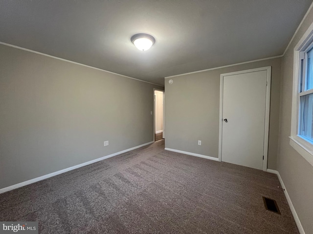 unfurnished bedroom featuring carpet floors