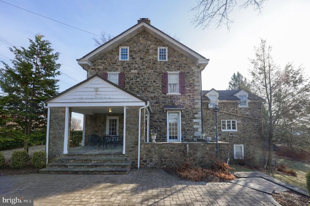 front facade with a porch