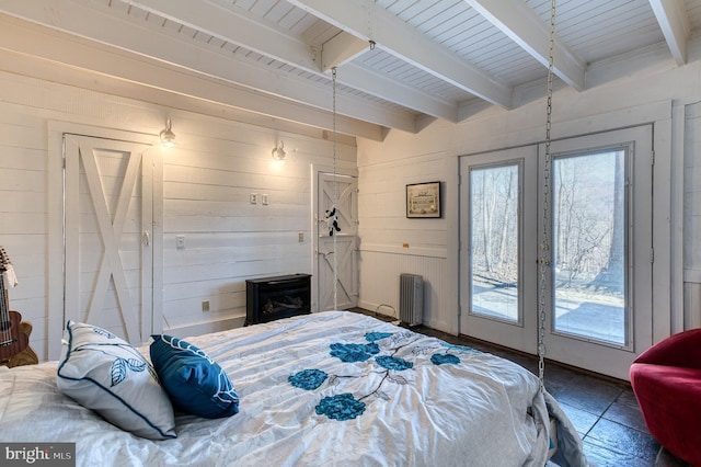 bedroom with radiator, access to exterior, beamed ceiling, wood walls, and wood ceiling