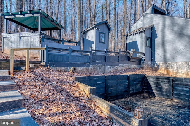 view of yard with a wooden deck