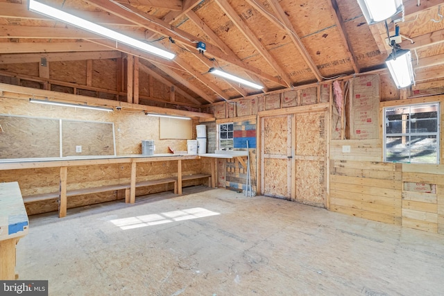 misc room with lofted ceiling