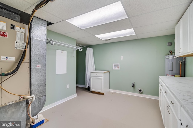 washroom featuring electric dryer hookup, cabinets, electric water heater, hookup for a washing machine, and heating unit